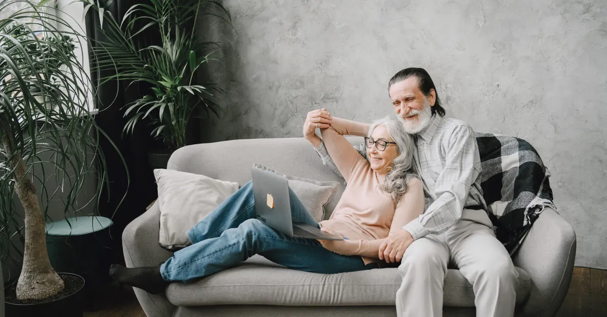 Older couple relaxing together at home